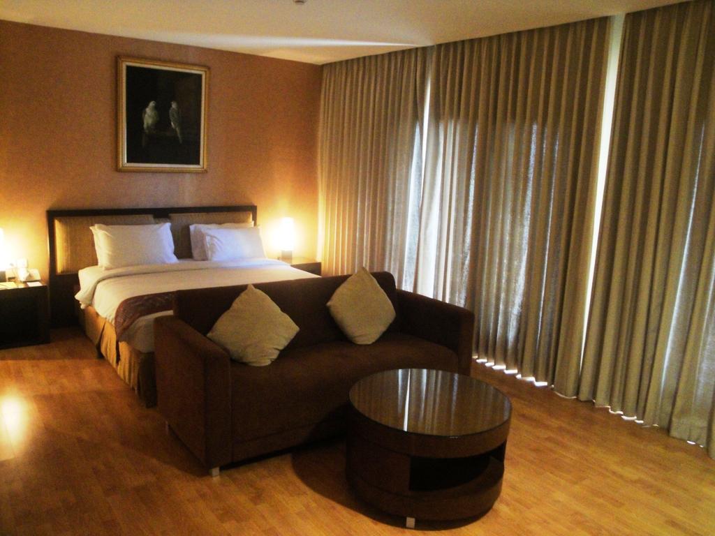 Sutanraja Hotel Manado Kamer foto