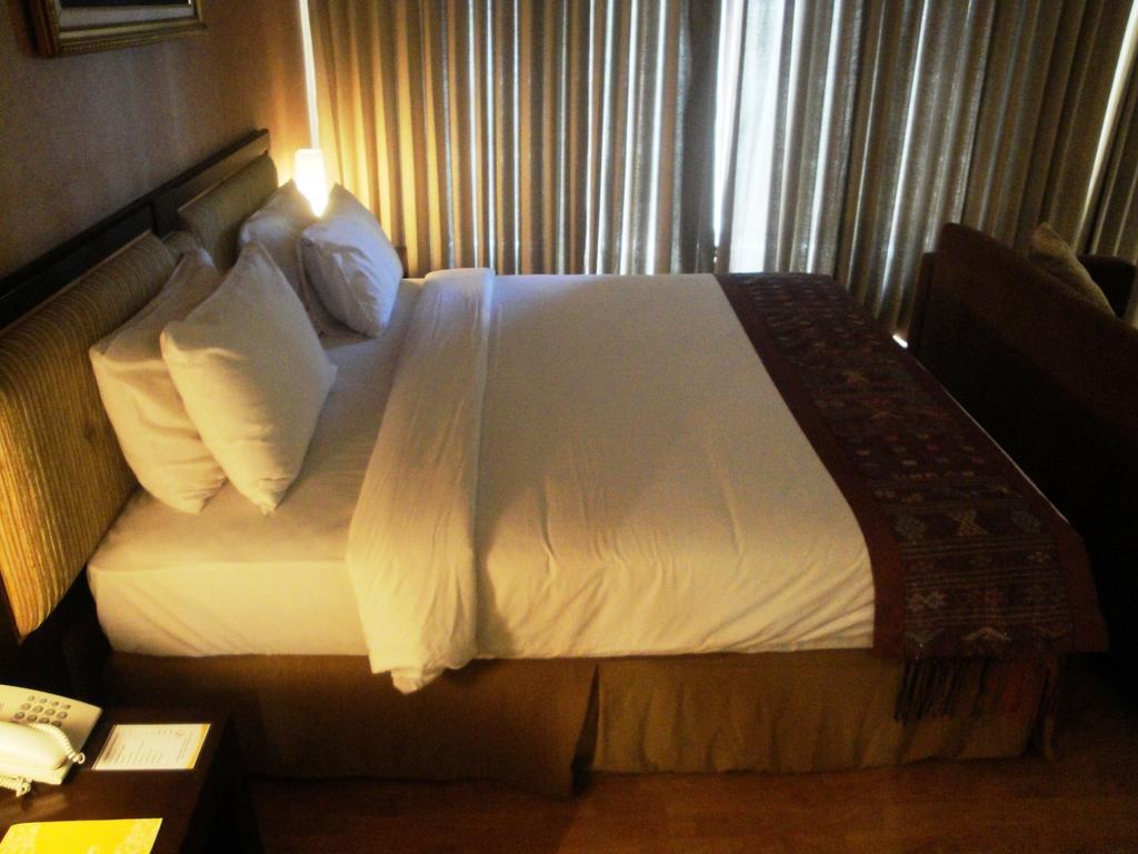 Sutanraja Hotel Manado Kamer foto